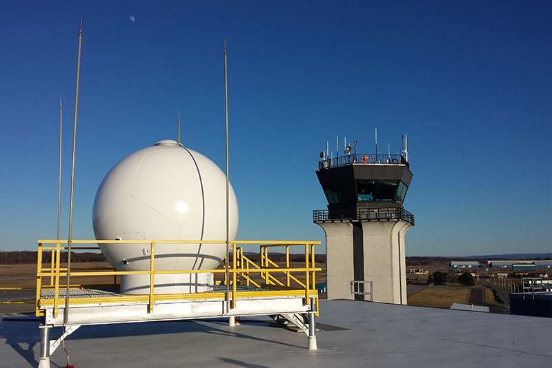 LSTAR air surveillance radar inside radome with moon in background